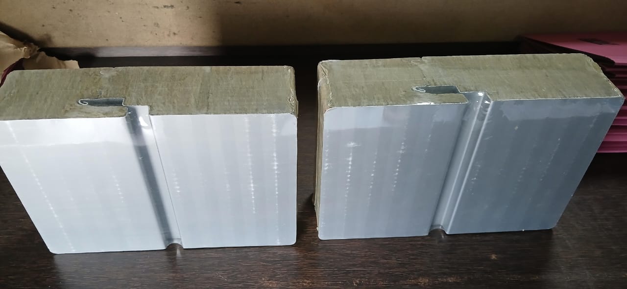 Cross-section view of Rinac R-Wool stonewool sandwich panel showing non-combustible core