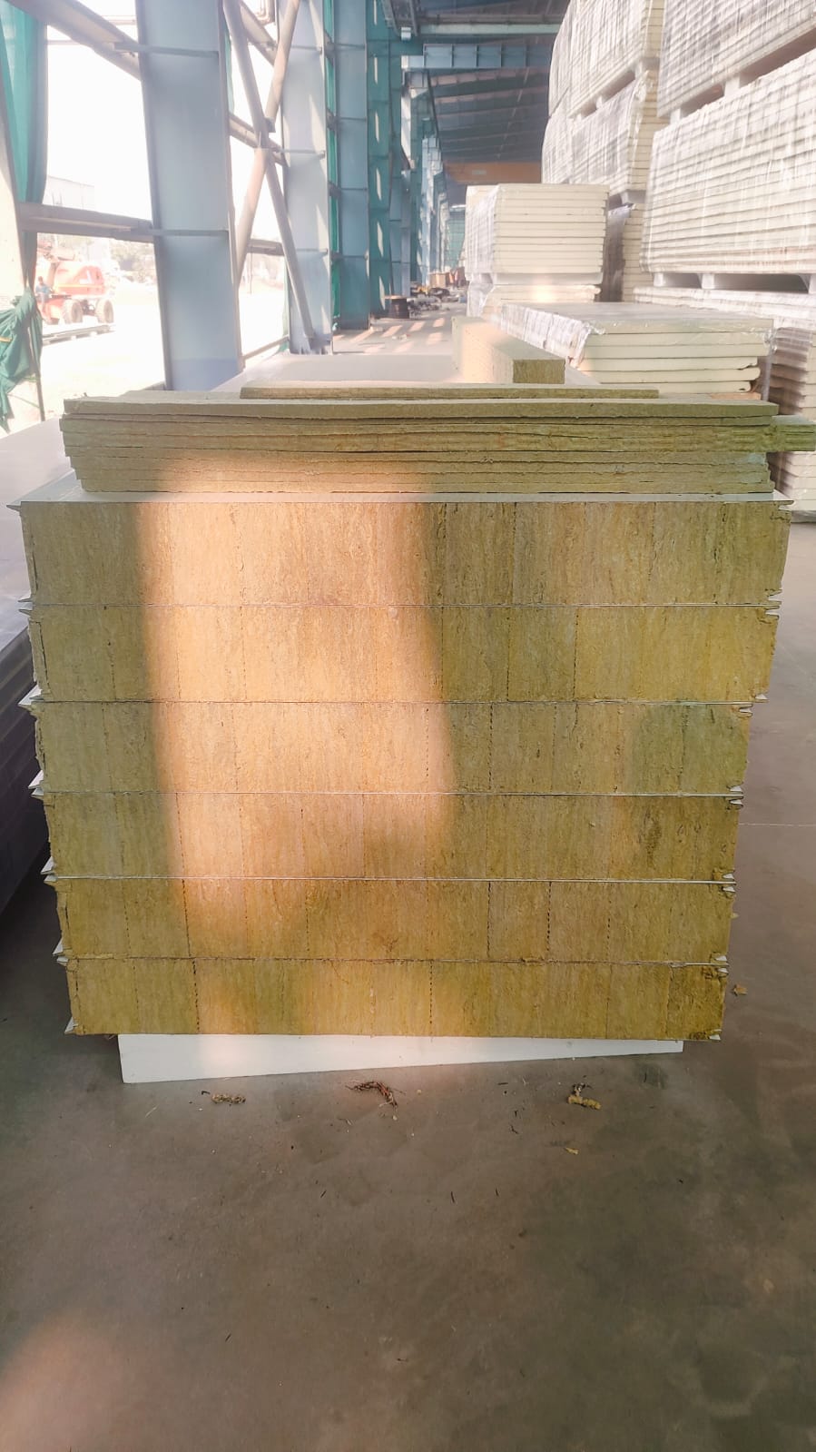 Stacked R-Wool stonewool panels showing multiple thickness options