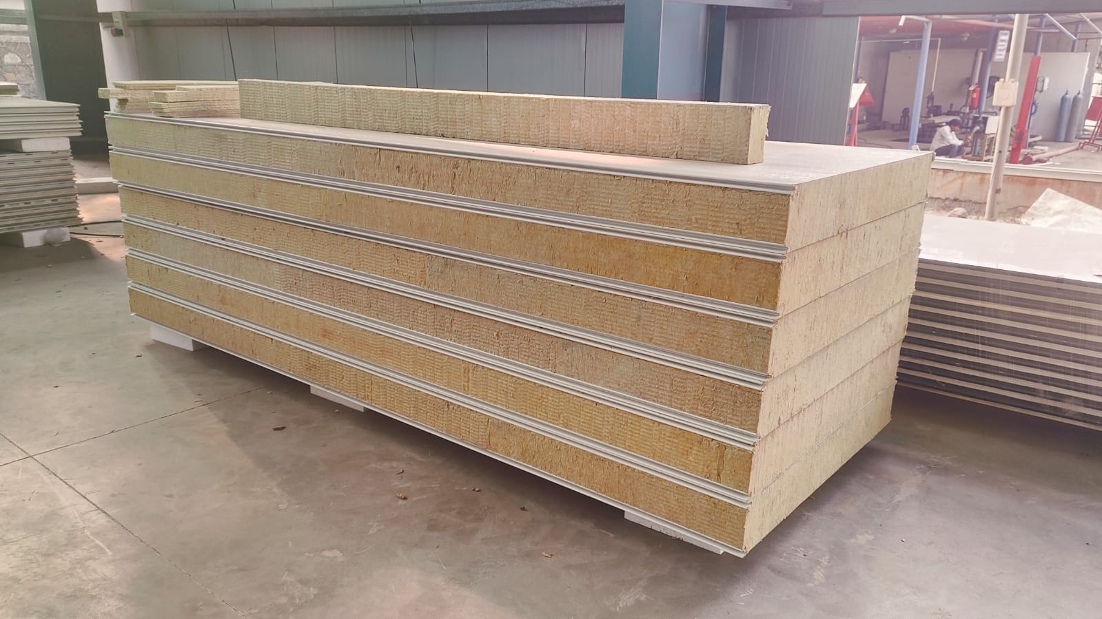 R-Wool stonewool insulated sandwich panels stacked at Rinac manufacturing plant