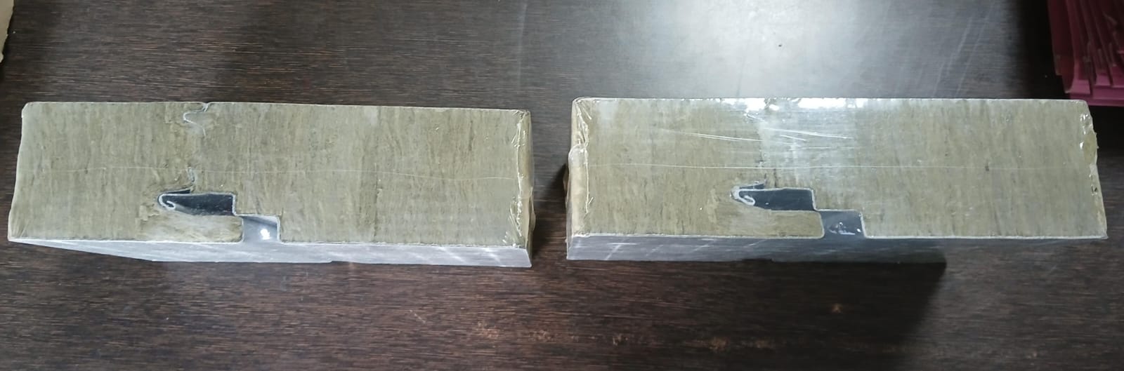 Top view of Rinac R-Wool panels with stone wool insulation core visible