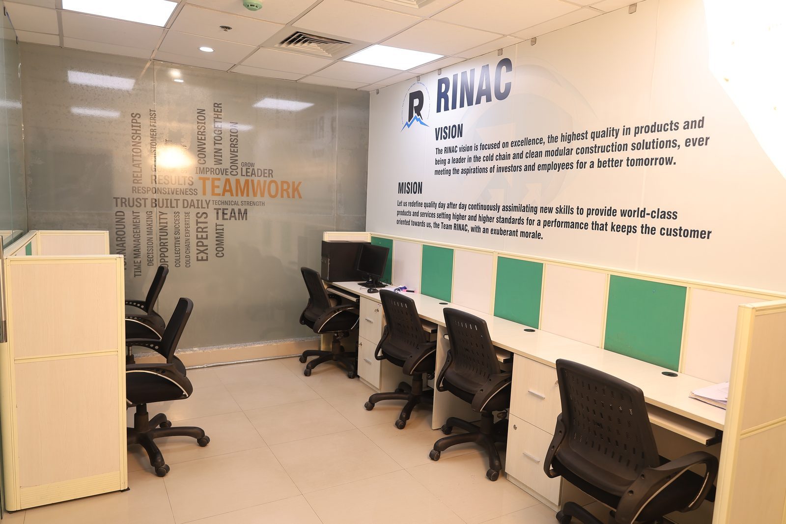 Rinac Chandigarh office workstations with the Vision and Mission wall